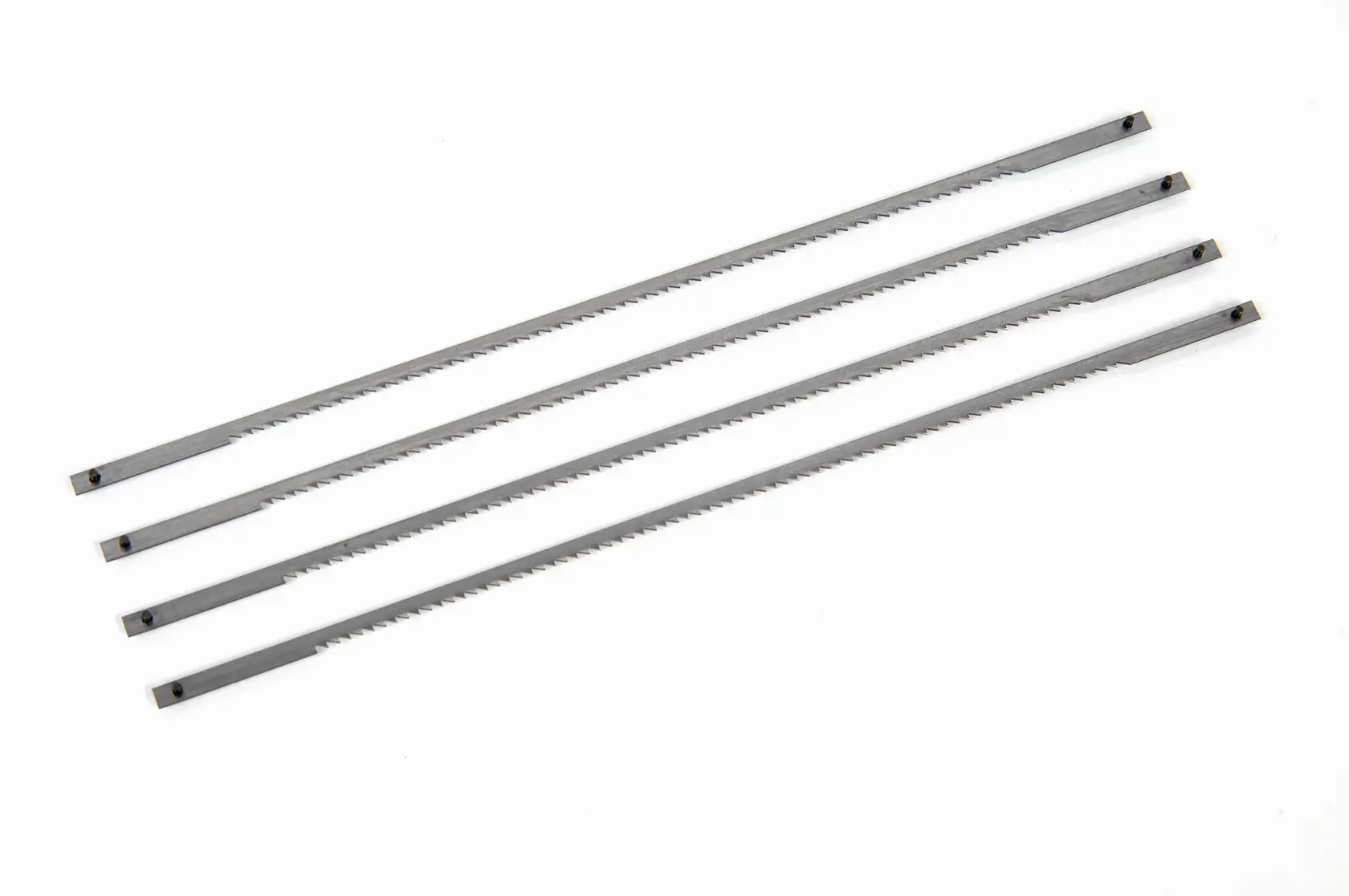 STANLEY 15-061 set of four silver coping saw blades, straight design, flat lay, on white background.