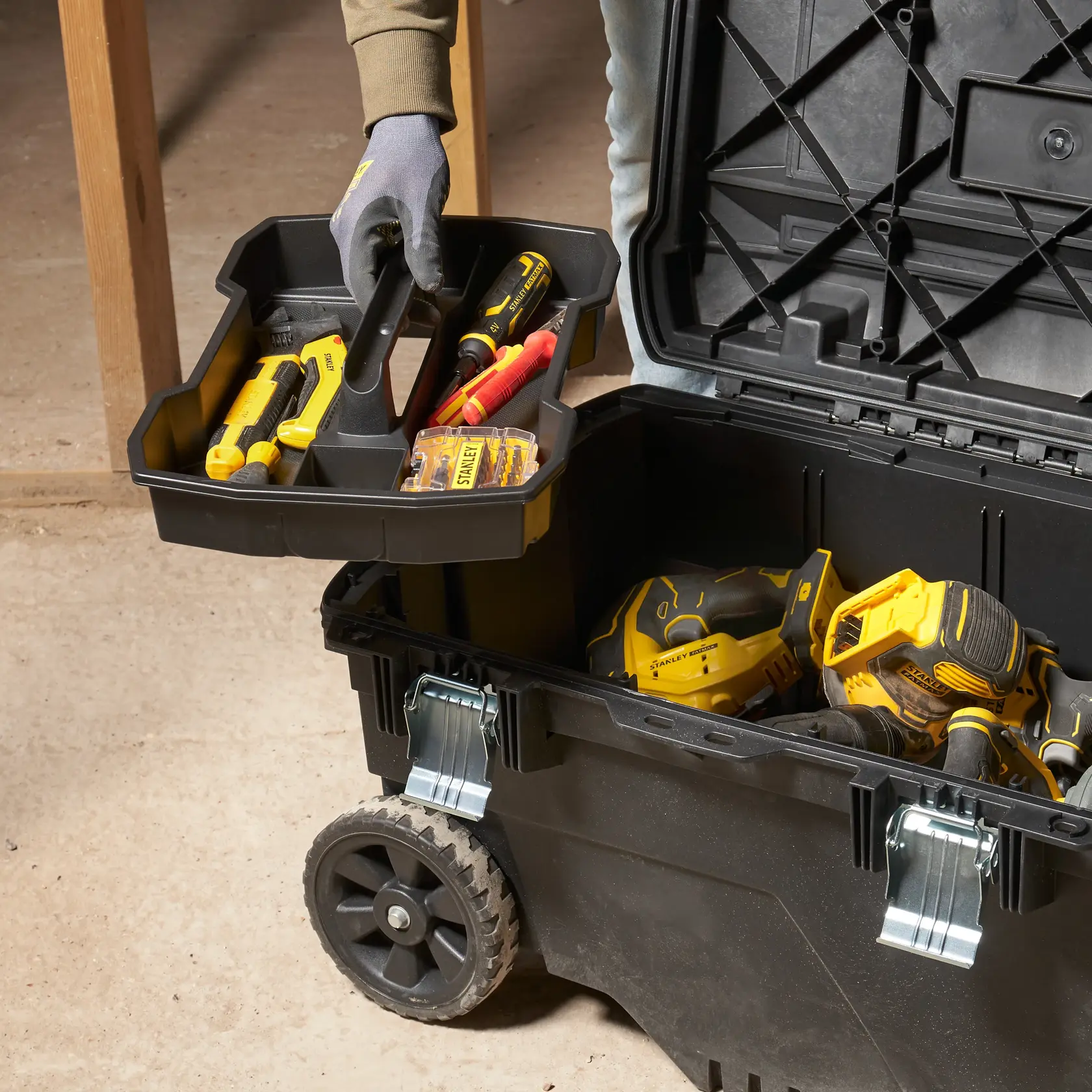 STANLEY FMST1-73601 rolling toolbox filled with tools, open lid, front angle photo.