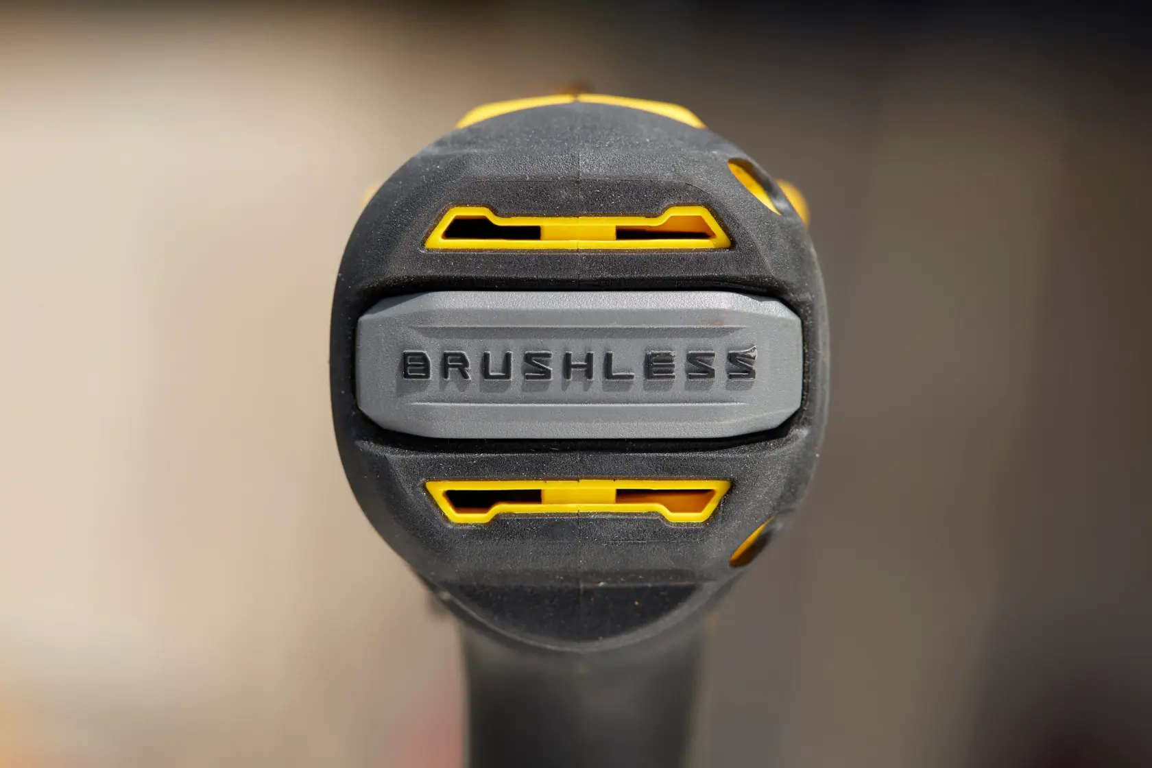 Photo of STANLEY SFMCD720B drill handle close-up, showing brushless marking and yellow-black accents.